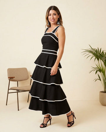 Black Aura Resort Tiered Romper Black Romper with Structured silhouette and Textured texture, front view product image for Resort Wear, a Palm Springs weekend, US Coastal Glam by floravincie