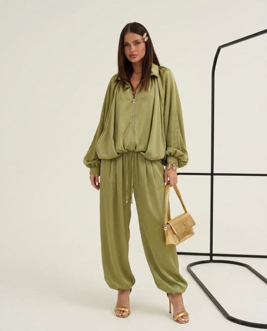 Olive Green Bloom Summer Satin Jumpsuit Olive Green Jumpsuit with Relaxed Fit silhouette and Satin texture, clean studio product view for City Evening, Weekend in The Hamptons, US East / Hamptons Elite