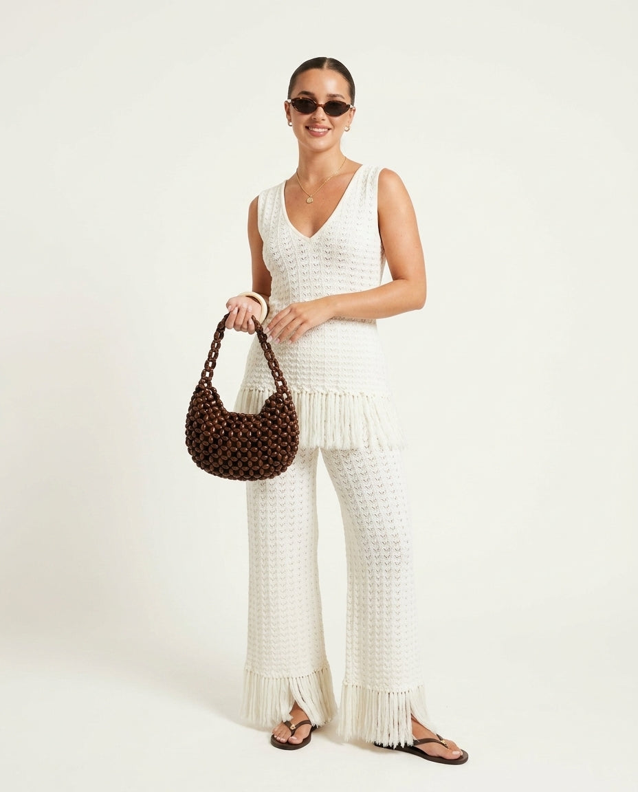 Ivory Bloom Resort Printed Romper Ivory Romper with Wide-Leg silhouette and Ribbed Knit texture, clean studio product view for Resort Wear, Coffee in Marais, Euro Chic Premium by floravincie