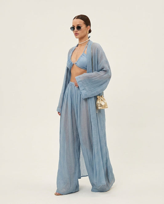 Light Blue Muse Resort Pleated Jacket Light Blue Jacket with Relaxed Fit silhouette and Textured texture, clean studio product view for Resort Wear, a private garden lunch, US East / Hamptons Elite by floravincie