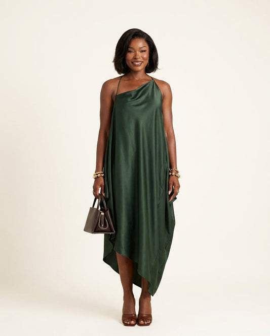 Dark Green Velvet Resort Satin Maxi Dress Dark Green Maxi Dress with Asymmetric silhouette and Satin texture, clean studio product view for Resort Wear, a gallery opening in Paris, Euro Chic Premium by floravincie