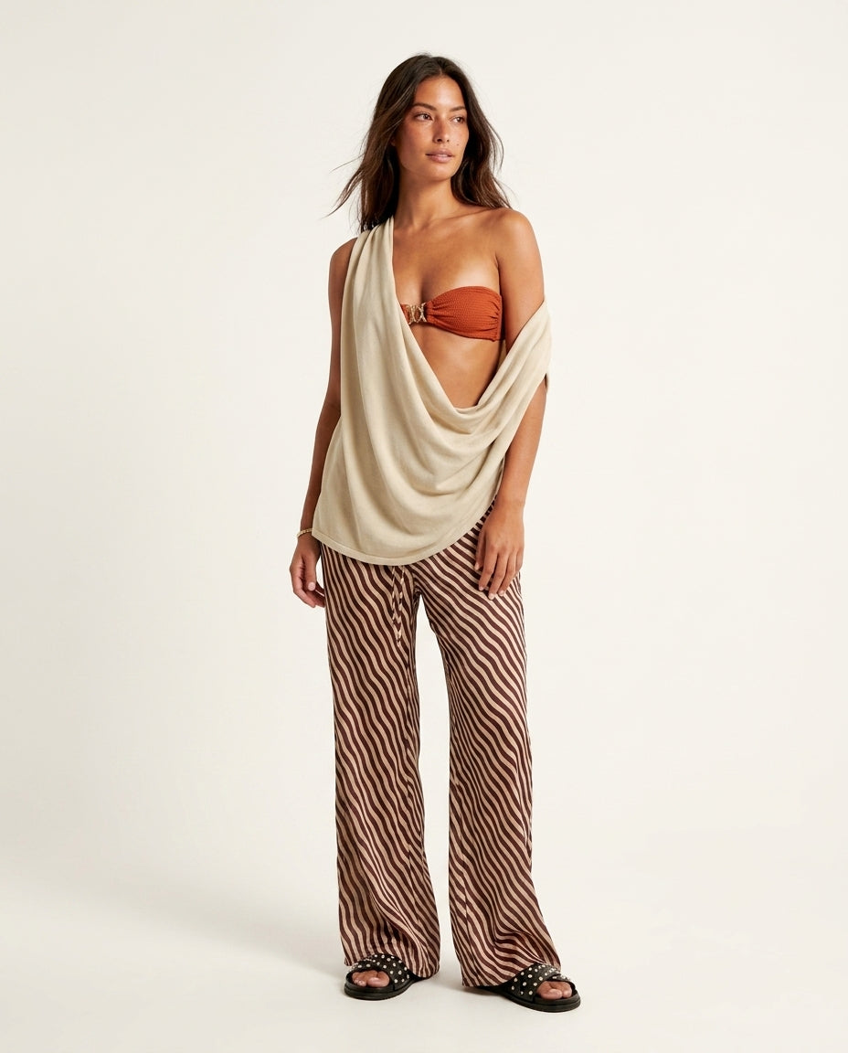 Ivory Lustre Resort Top Ivory Top with Asymmetric silhouette and Ribbed Knit texture, clean studio product view for Resort Wear, a London dinner reservation, Euro Chic Premium by floravincie