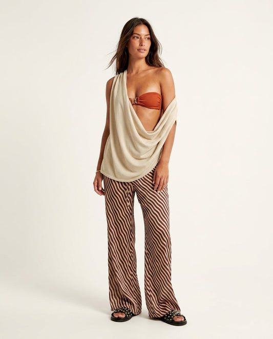 Ivory Lustre Resort Top Ivory Top with Asymmetric silhouette and Ribbed Knit texture, clean studio product view for Resort Wear, a London dinner reservation, Euro Chic Premium by floravincie