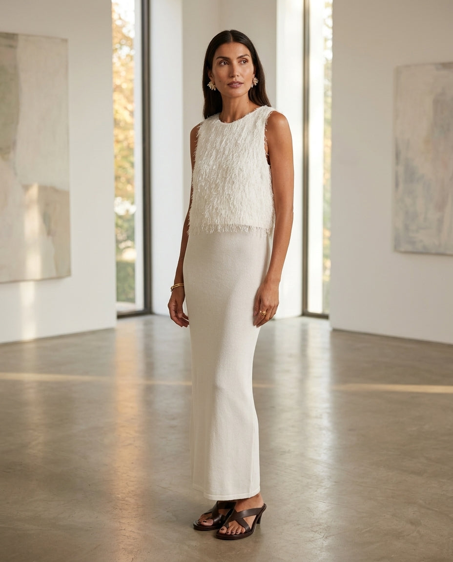 Ivory Poise Evening Ribbed Skirt Set Ivory Skirt Set with Flowing silhouette and Ribbed Knit texture, lifestyle scene image for City Dinner, a cafe plan, Fall city dinners, cafe plans, gallery evenings, and polished weekend styling, Euro Chic Premium by floravincie