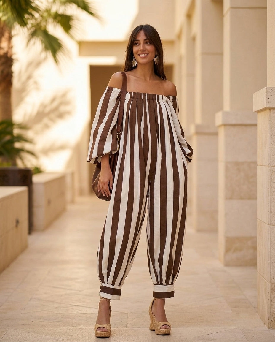 Brown Aura Resort Striped Jumpsuit Brown Jumpsuit with Wide-Leg silhouette and Linen Blend texture, lifestyle scene image for Resort Wear, a private garden lunch, US East / Hamptons Elite