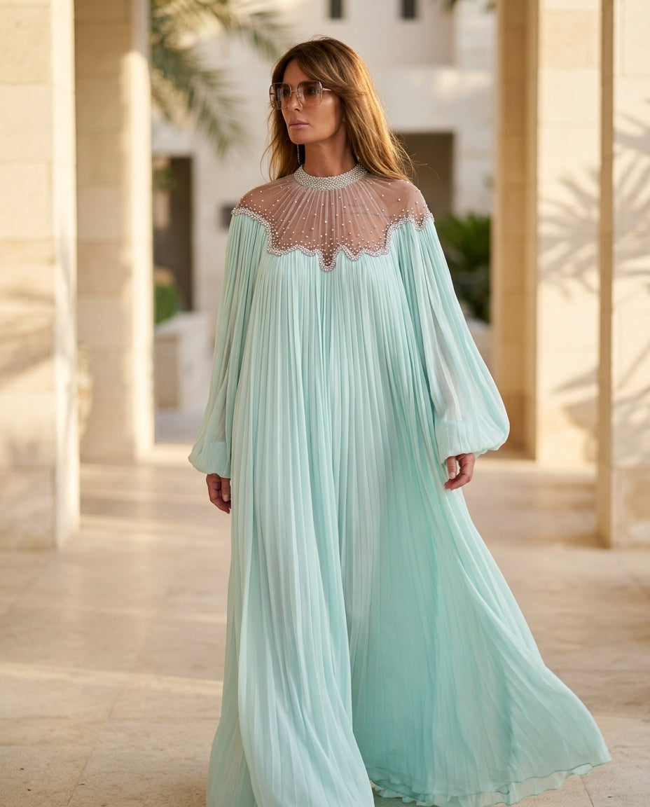 Mint Green Lustre Resort Pleated Romper Mint Green Romper with Relaxed Fit silhouette and Textured texture, lifestyle scene image for Resort Wear, an estate dinner at golden hour, US East / Hamptons Elite