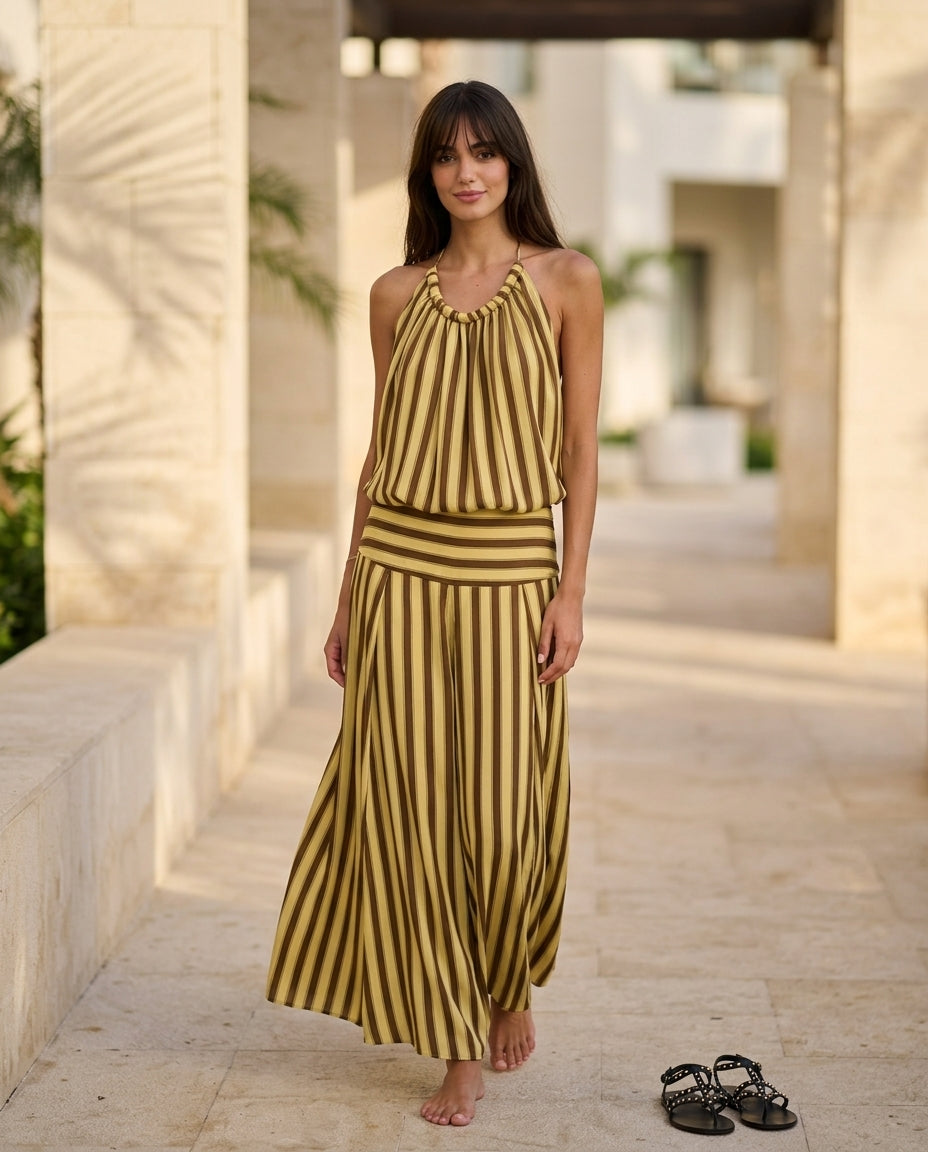 Butter Yellow Charm Resort Striped Romper Butter Yellow Romper with Relaxed Fit silhouette and Textured texture, lifestyle scene image for Resort Wear, an estate dinner at golden hour, US East / Hamptons Elite by floravincie
