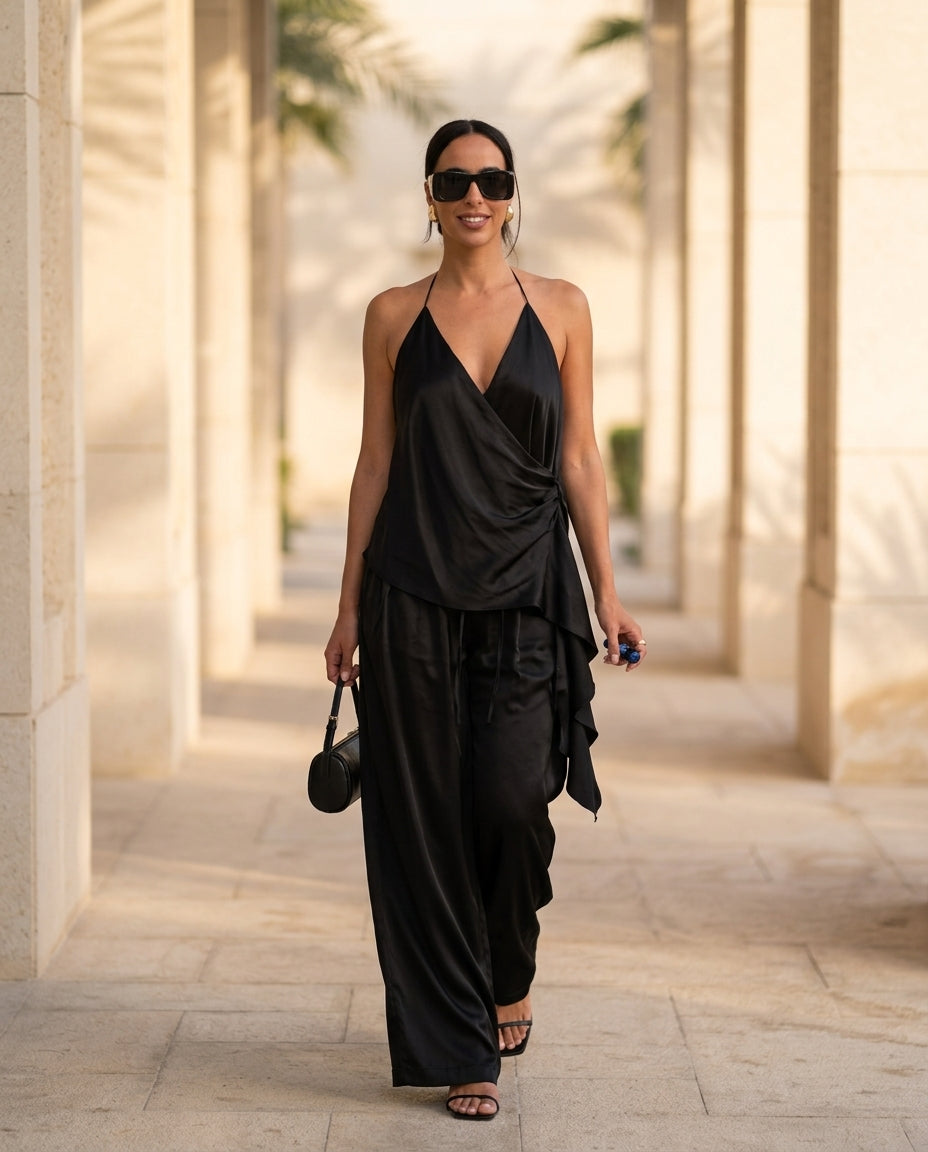 Black Velvet Evening Satin Pant Set Black Pant Set with Asymmetric silhouette and Satin texture, lifestyle scene image for Resort Wear, Brunch in SoHo, US Coastal Glam by floravincie