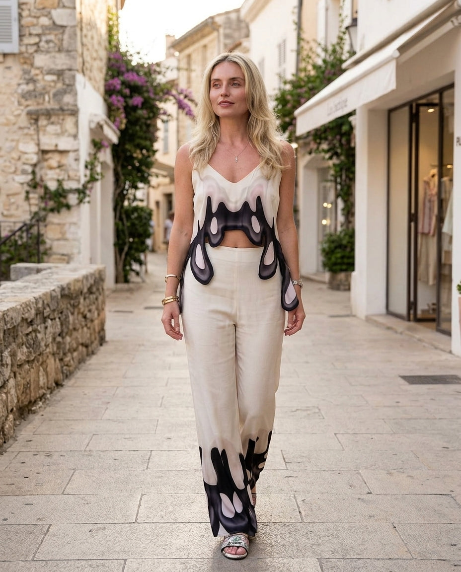 Ivory Glow Wedding Guest Abstract Print Pant Set Ivory Pant Set with Asymmetric silhouette and Satin texture, outdoor styling image for Wedding Guest, an office-to-dinner transition, Fall current summer selling first with a light late-summer/pre-fall acce by floravincie