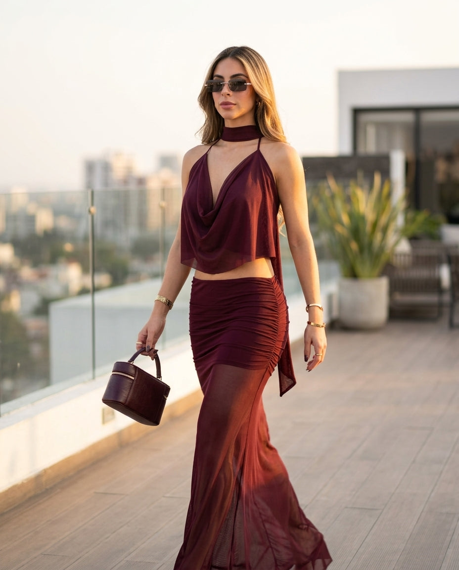 Burgundy Muse Evening Ruched Skirt Set Burgundy Skirt Set with Asymmetric silhouette and Textured texture, outdoor styling image for Date Night, an estate dinner at golden hour, US East / Hamptons Elite