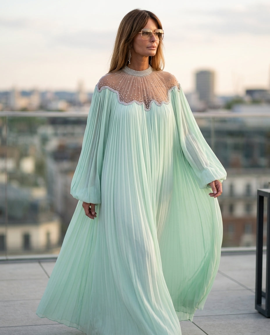 Mint Green Lustre Resort Pleated Romper Mint Green Romper with Relaxed Fit silhouette and Textured texture, outdoor styling image for Resort Wear, an estate dinner at golden hour, US East / Hamptons Elite