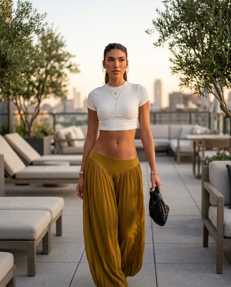 Olive Green Muse Resort Textured Romper Olive Green Romper with Wide-Leg silhouette and Textured texture, outdoor styling image for Resort Wear, a rooftop dinner in LA, US Coastal Glam by floravincie
