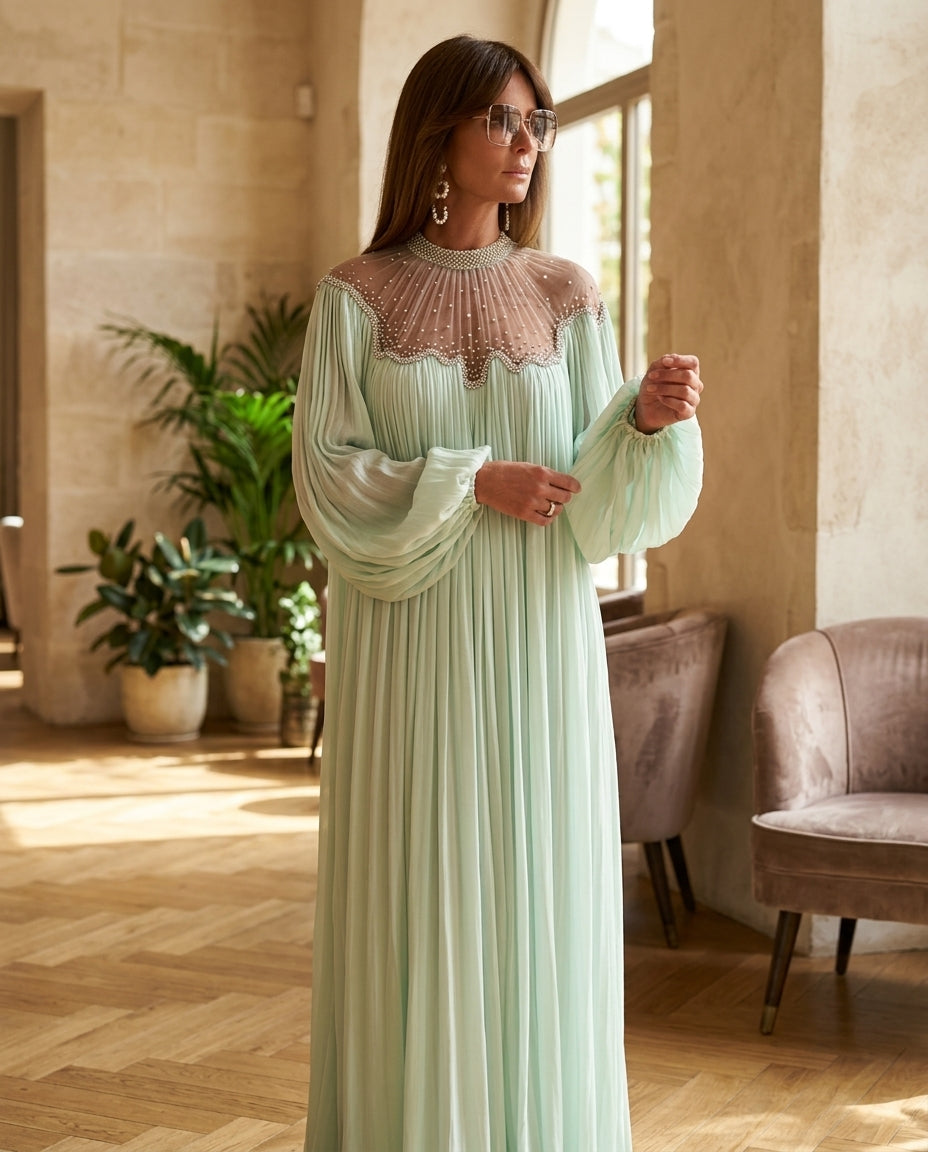 Mint Green Lustre Resort Pleated Romper Mint Green Romper with Relaxed Fit silhouette and Textured texture, editorial ecommerce scene for Resort Wear, an estate dinner at golden hour, US East / Hamptons Elite