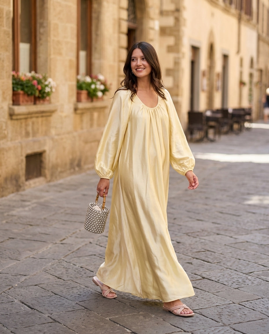 Pale Yellow Glow Resort Satin Maxi Dress Pale Yellow Maxi Dress with Relaxed Fit silhouette and Satin texture, fabric and construction detail for Resort Wear, an estate dinner at golden hour, US East / Hamptons Elite by floravincie