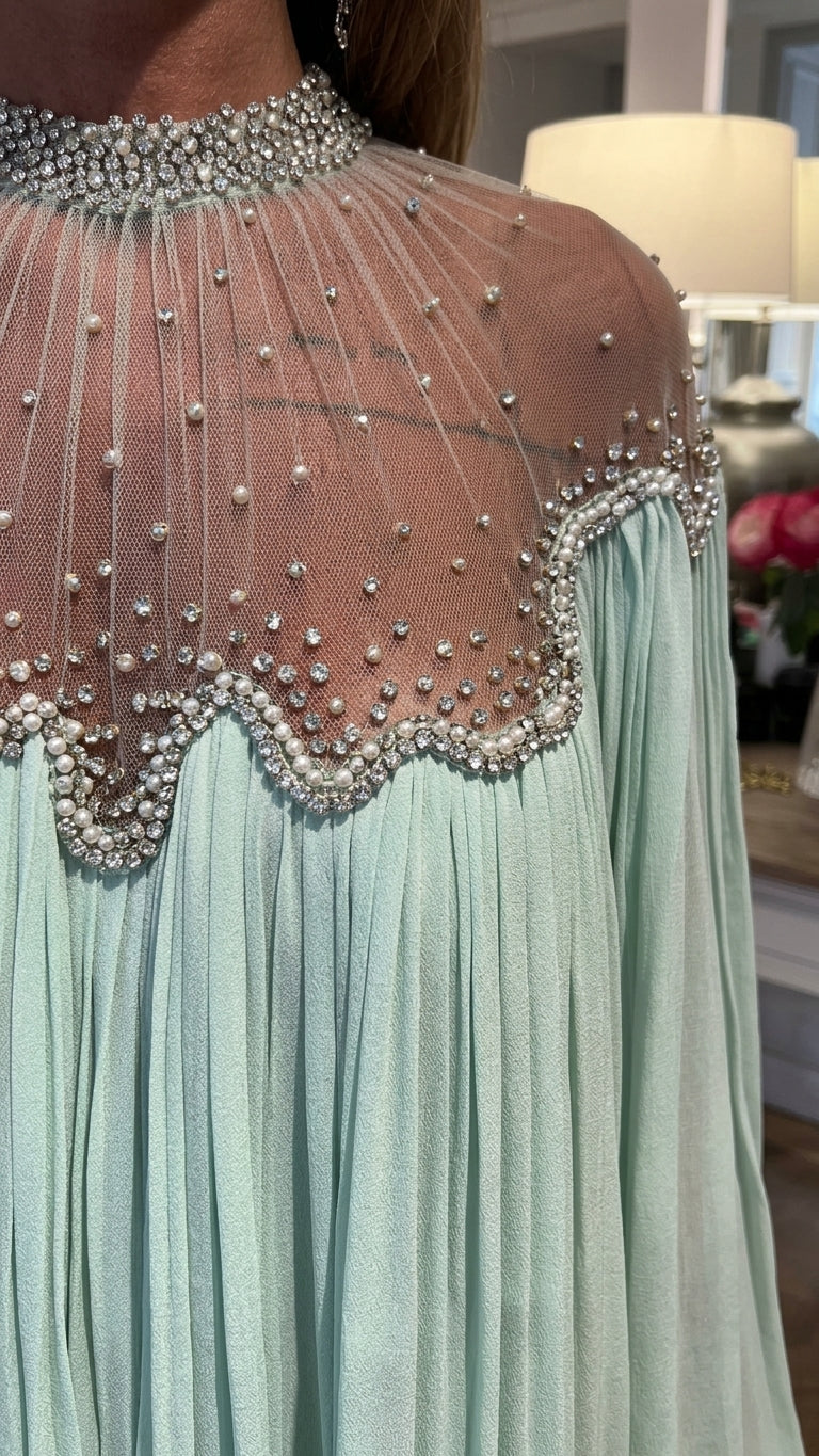 Mint Green Lustre Resort Pleated Romper Mint Green Romper with Relaxed Fit silhouette and Textured texture, additional styling view for Resort Wear, an estate dinner at golden hour, US East / Hamptons Elite