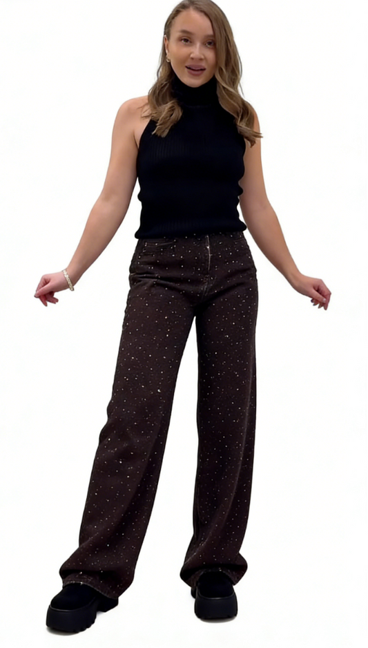 Black satin faux fur bomber jacket and sequined wide-leg trouser suit