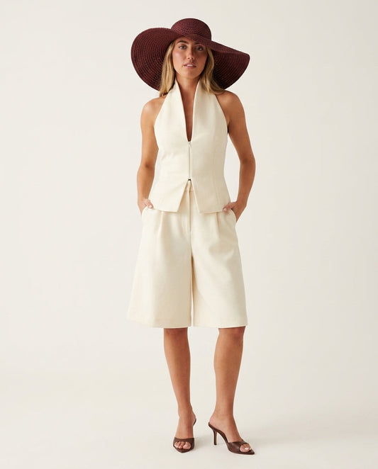 Ivory Eyelet Halter Short Set "Sienna" Ivory Short Set with Asymmetric silhouette and Linen Blend texture, clean studio product view for Resort Wear, Evening in Amalfi, Euro Chic Premium