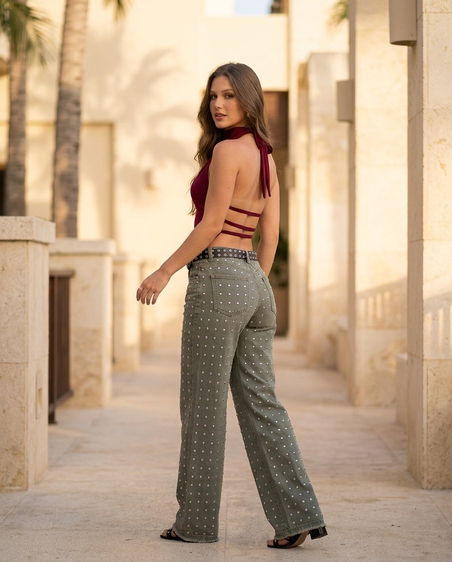 Burgundy Eyelet Halter Pant Set "Rosalie" Burgundy Pant Set with Wide-Leg silhouette and Textured texture, lifestyle scene image for Weekend Escape, Sunset in Malibu, US Coastal Glam