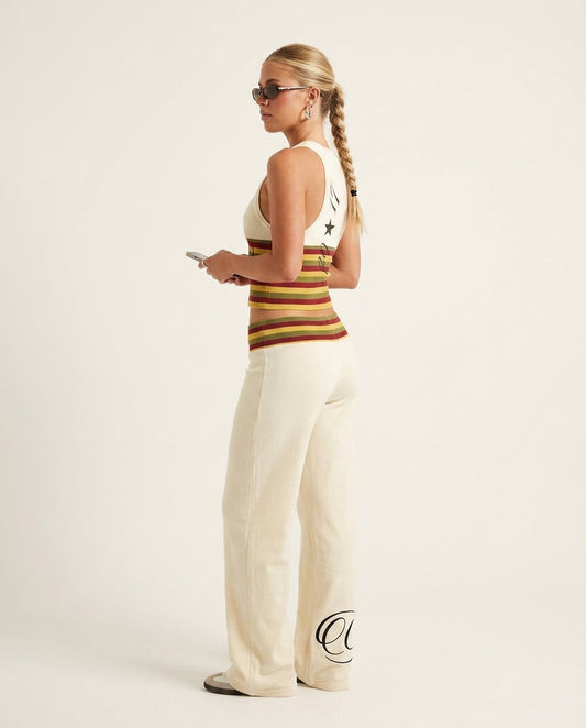 Ivory Eyelet V-Neck Pant Set "Mara" Ivory Pant Set with Wide-Leg silhouette and Textured texture, clean studio product view for Weekend Escape, a polished coastal brunch, US East / Hamptons Elite