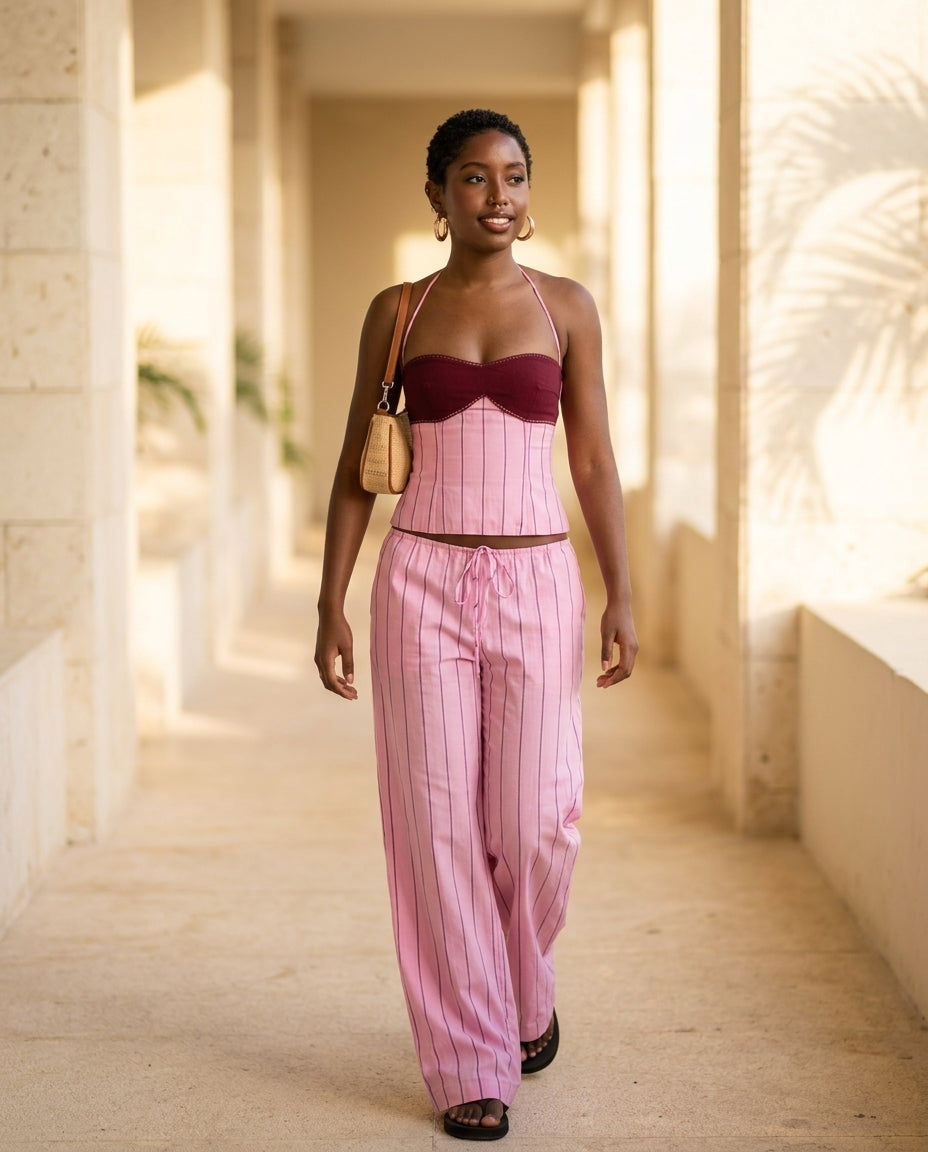 Pink Eyelet Halter Two-Piece Set "Mara" Pink Two-Piece Set with Relaxed Fit silhouette and Textured texture, lifestyle scene image for Summer Getaway, Coffee in Marais, Euro Chic Premium