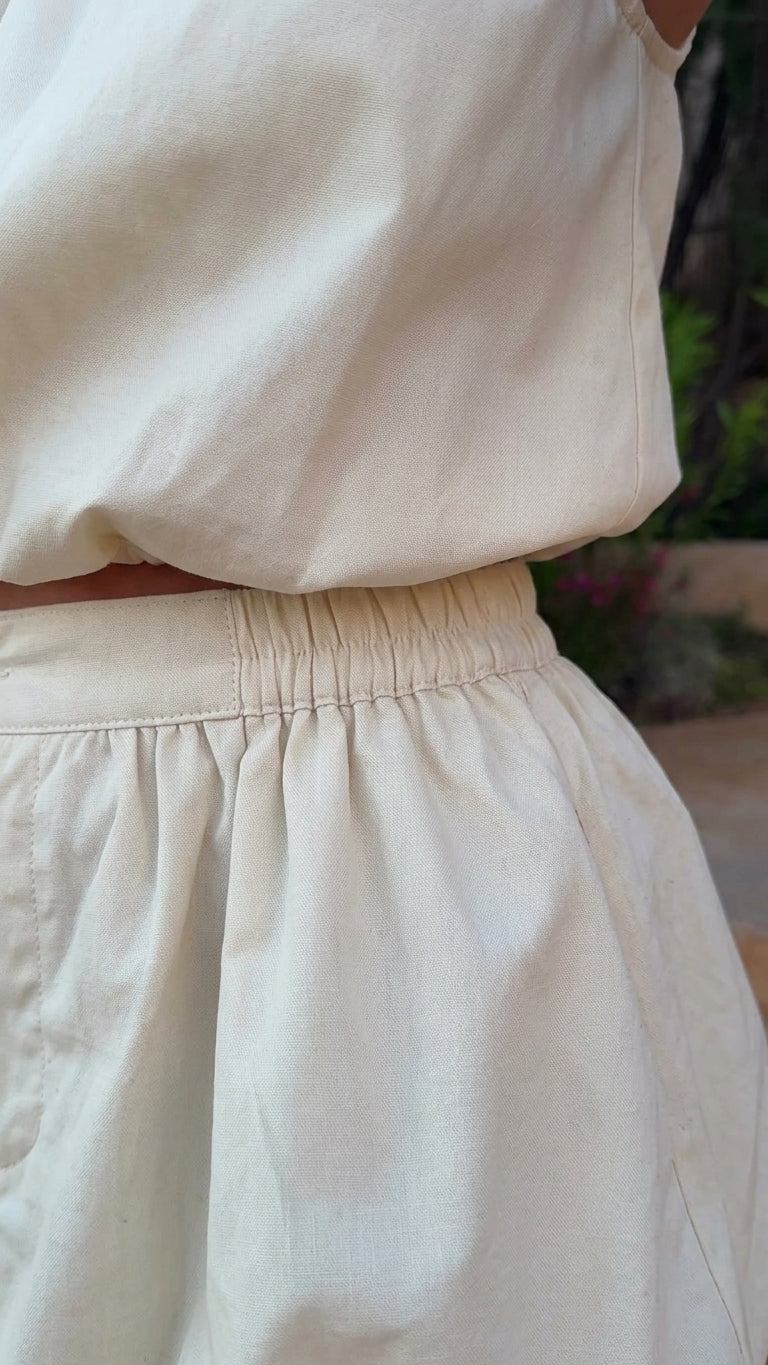 Ivory Eyelet V-Neck Skirt Set "Valeria" Ivory Skirt Set with Relaxed Fit silhouette and Textured texture, additional styling view for Resort Wear, a gallery opening in Paris, Euro Chic Premium