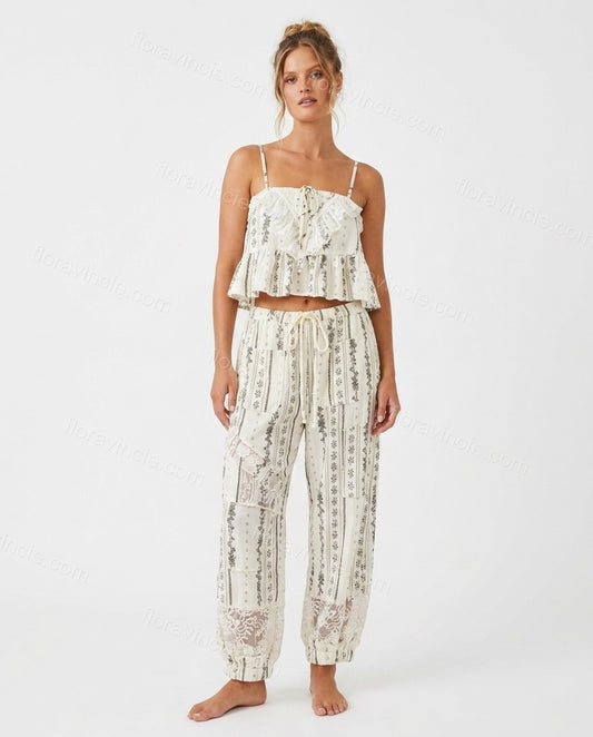 Ivory Whisper Terrace Dinner Lace Jumpsuit Ivory Jumpsuit with Cropped silhouette and Textured texture, clean studio product view for Pre-Fall, a fall city dinner, Fall current summer selling first with a light late-summer/pre-fall accent: make it wearabl by floravincie