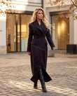 Deep Black with Slight Plum Coat, three-quarter brand lifestyle view, by Floravincie