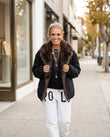 Black Jacket, movement and fit lifestyle view, by Floravincie