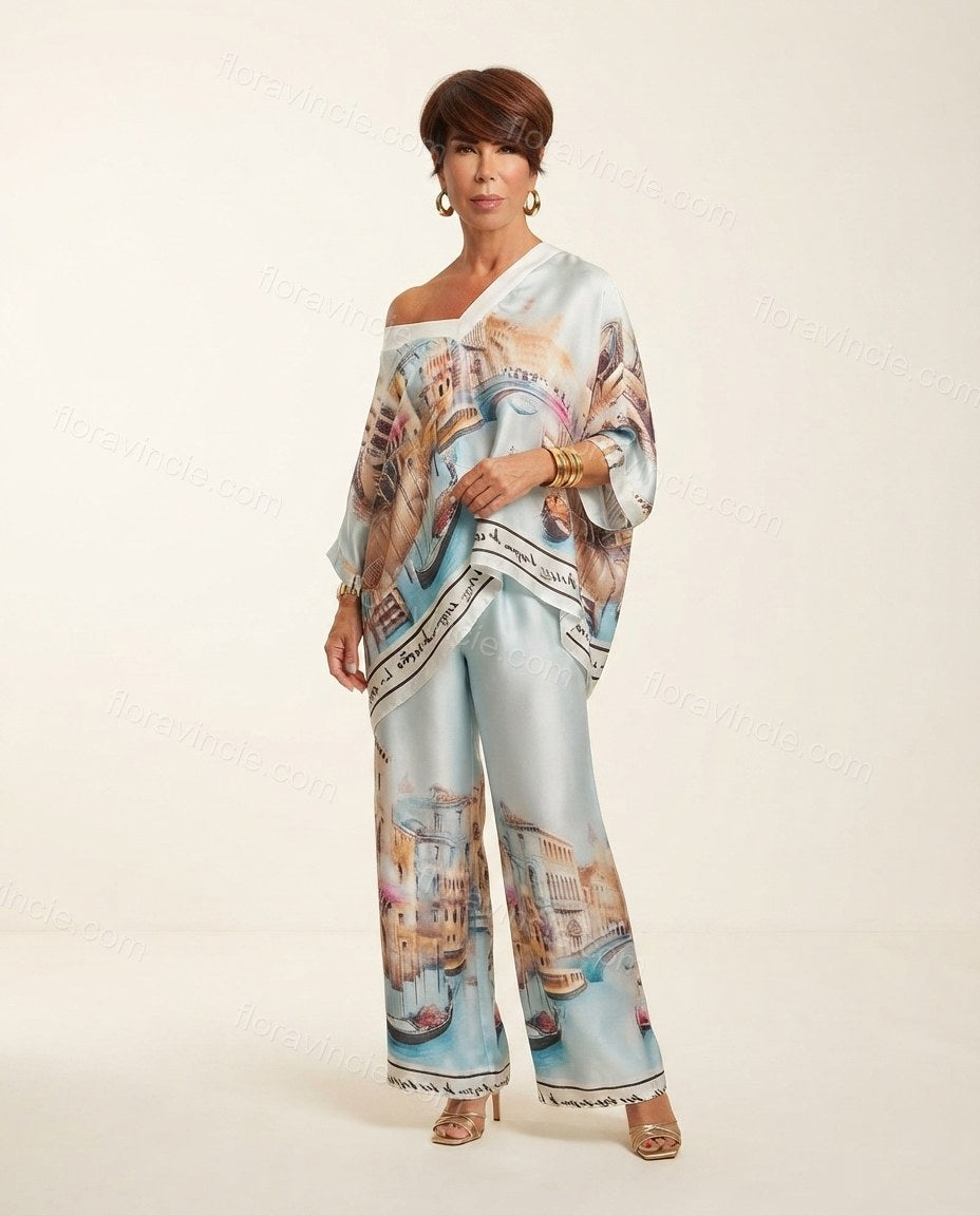 Light Blue Aura Vacation Edit Printed Pant Set Light Blue Pant Set with Asymmetric silhouette and Satin texture, clean studio product view for Pre-Fall, an office-to-dinner transition, Fall current summer selling first with a light late-summer/pre-fall ac by floravincie