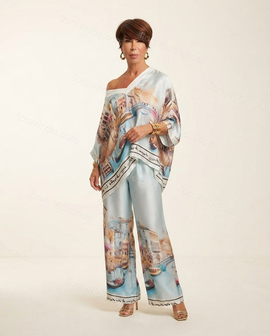 Light Blue Aura Vacation Edit Printed Pant Set Light Blue Pant Set with Asymmetric silhouette and Satin texture, clean studio product view for Pre-Fall, an office-to-dinner transition, Fall current summer selling first with a light late-summer/pre-fall ac by floravincie