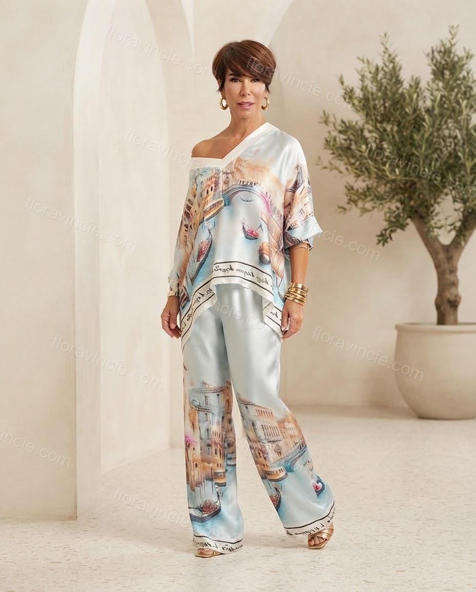Light Blue Aura Vacation Edit Printed Pant Set Light Blue Pant Set with Asymmetric silhouette and Satin texture, front view product image for Pre-Fall, an office-to-dinner transition, Fall current summer selling first with a light late-summer/pre-fall acc by floravincie