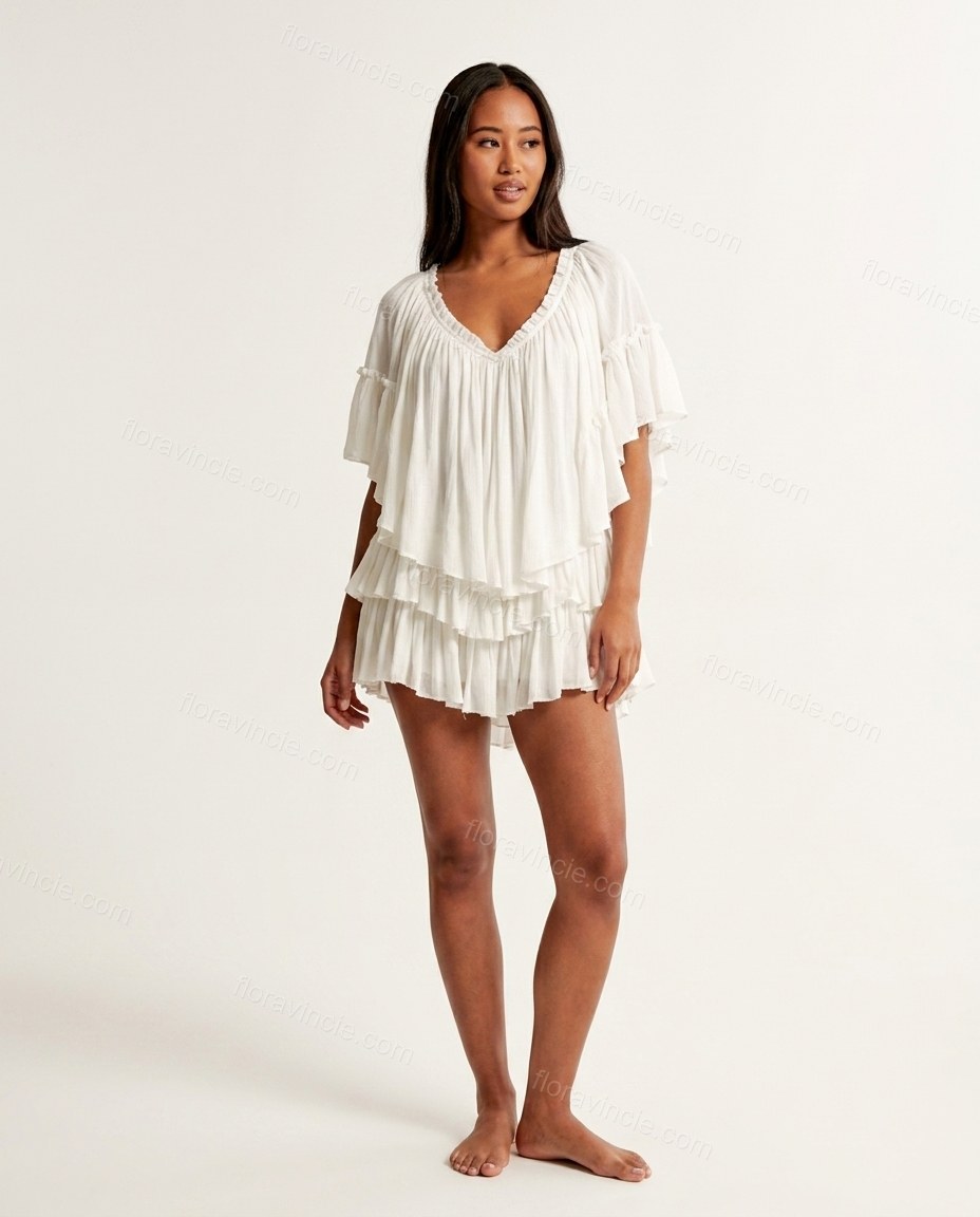 Ivory Refined Tiered V-Neck Romper by floravincie