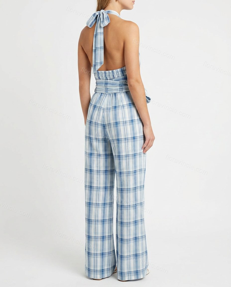 White Polished Textured Halter Jumpsuit by Floravincie