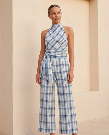 White Polished Textured Halter Jumpsuit by Floravincie
