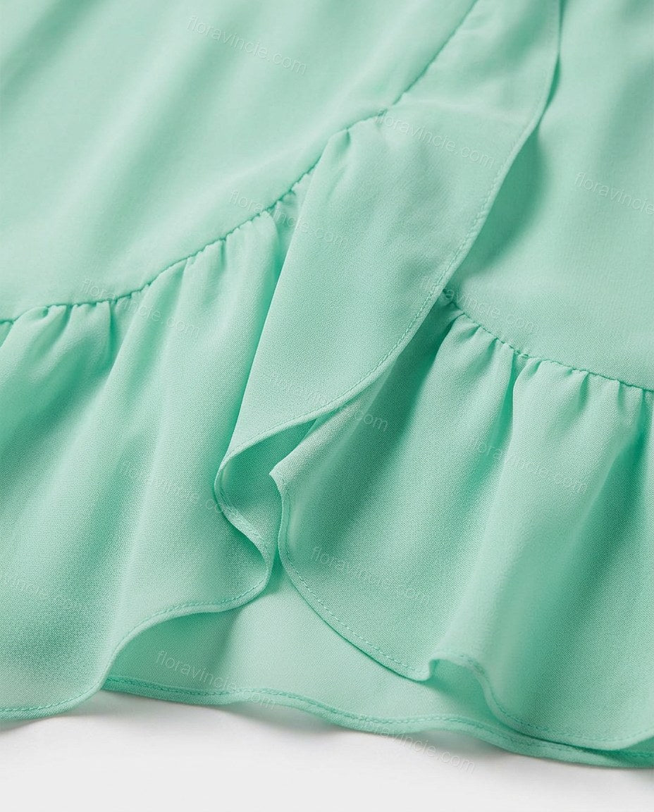Mint Green Strapless Ruffled Peplum Dress, close-up of peplum waist, tiered skirt and ruffle trim, by Floravincie