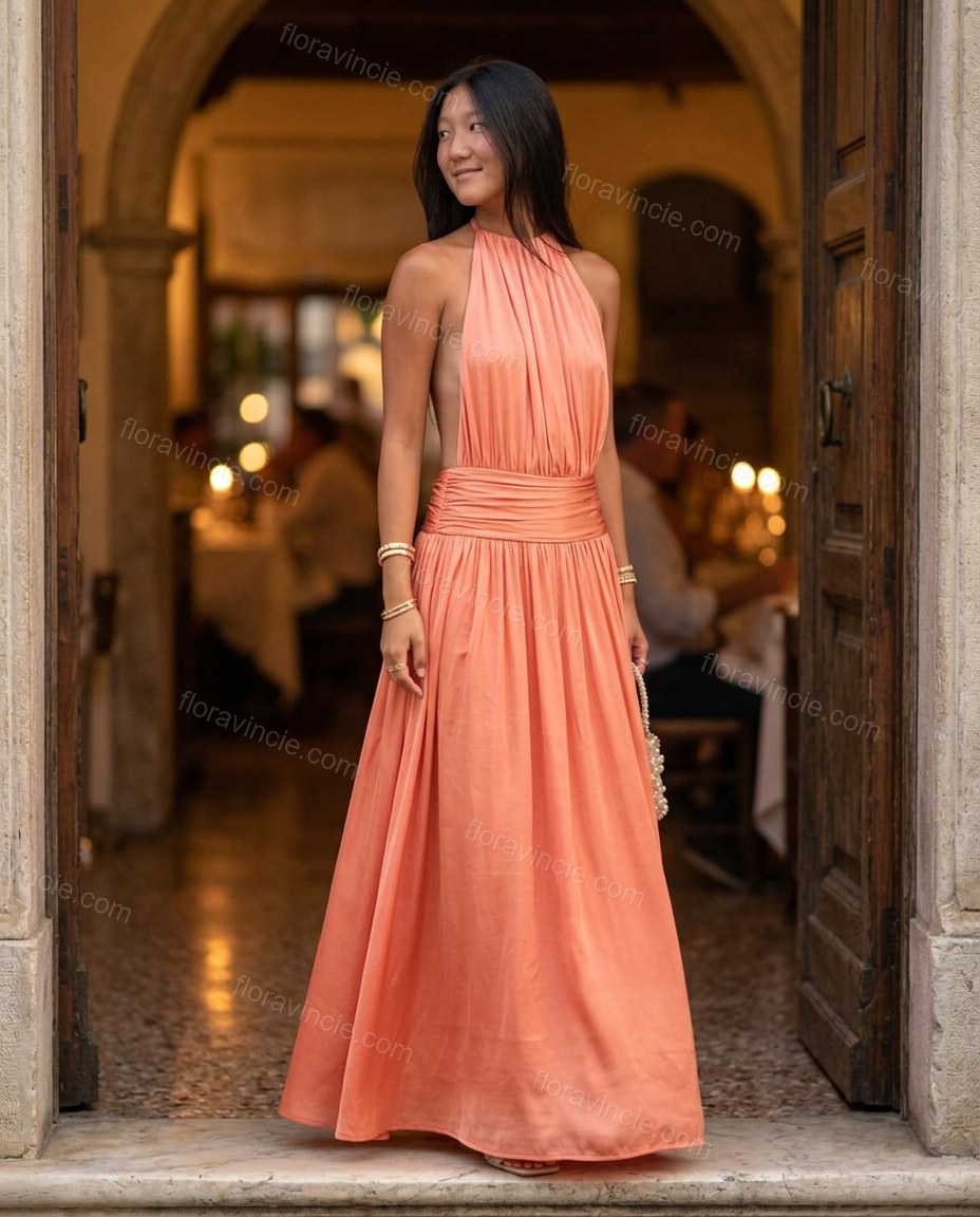 Coral Maxi Open-Back Halter Dress, three-quarter brand lifestyle view, by Floravincie
