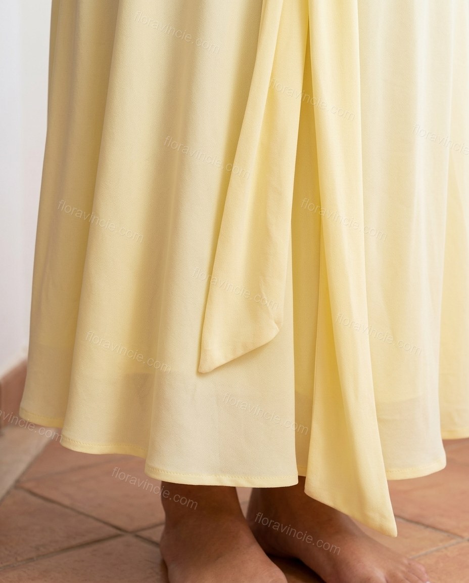 Light Yellow Maxi Knit Dress, close-up of twisted bodice, midriff cut-out and ruched waist, by Floravincie