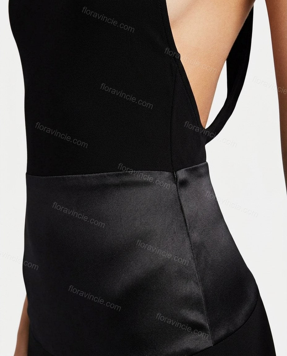 Black Maxi Open-Back Halter Dress, close-up of low back, contrasting fabric panel and halter neckline, by Floravincie