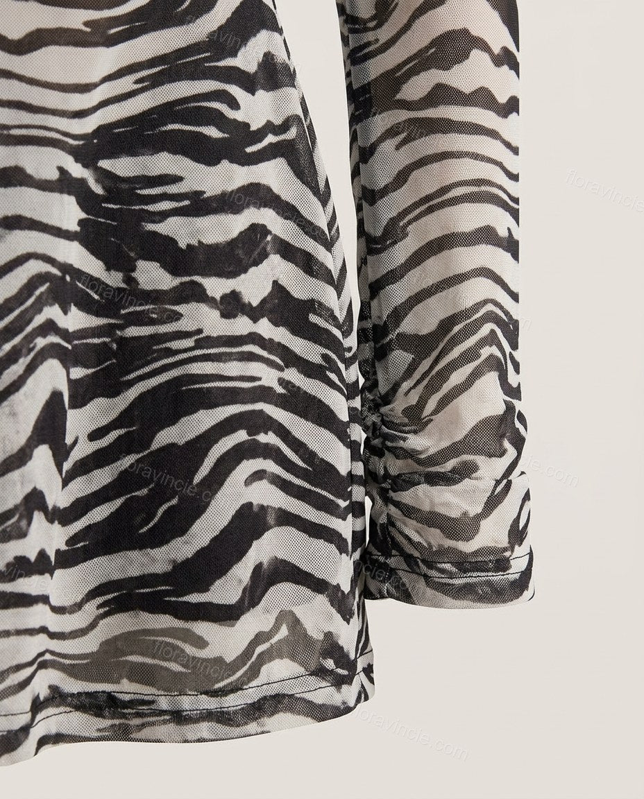 Black Animal Print Mini Open-Back Dress, close-up of animal print, by Floravincie