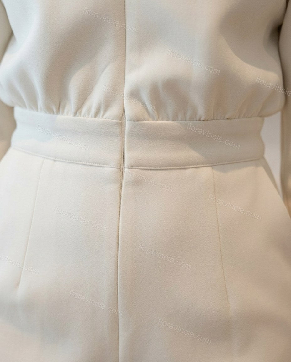 Off-white Knit Jumpsuit, close-up of front zipper, elastic waist and side pockets, by Floravincie