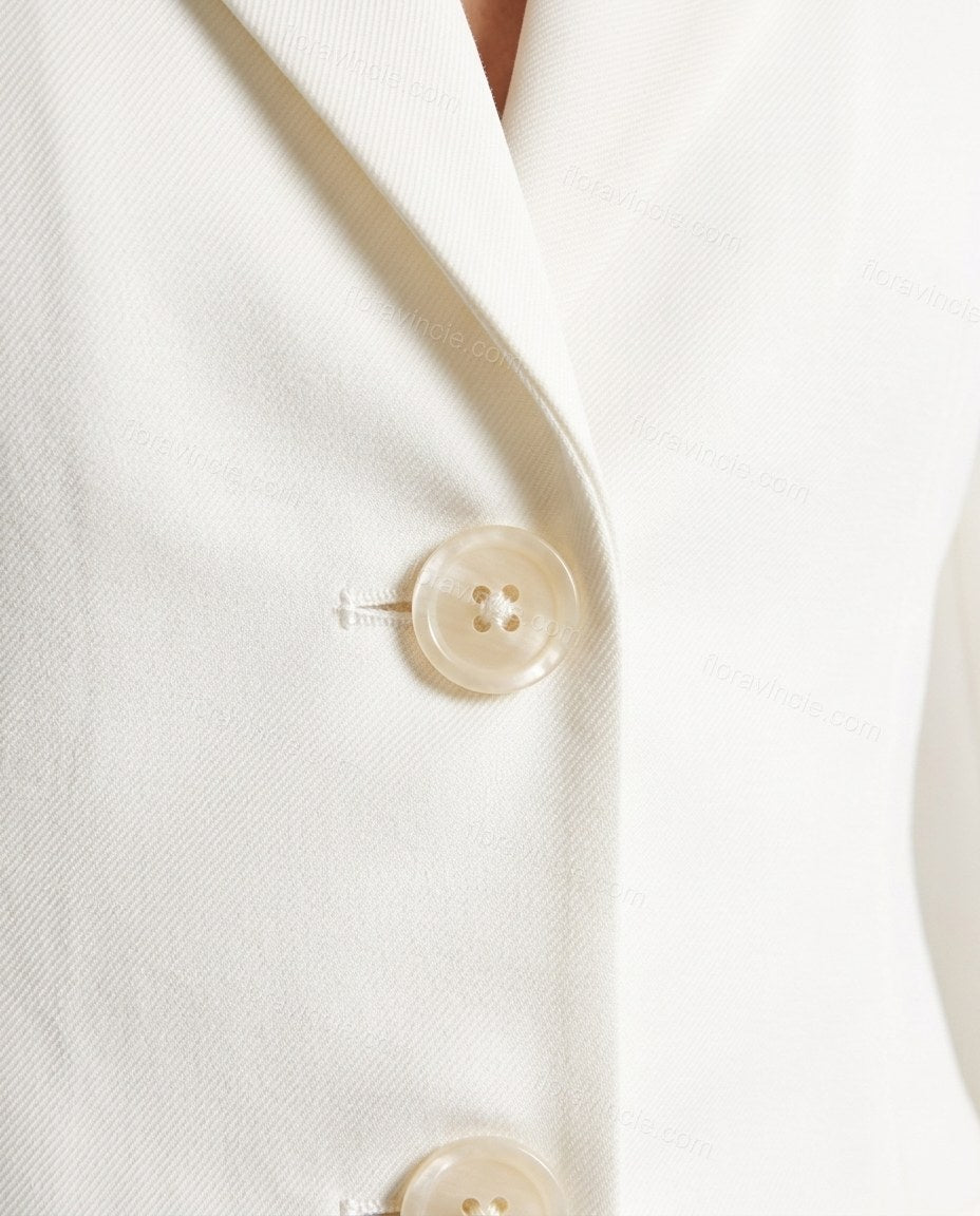 White Blazer & Skirt Set, close-up of three-button front closure, flap pockets and notched lapels, by Floravincie
