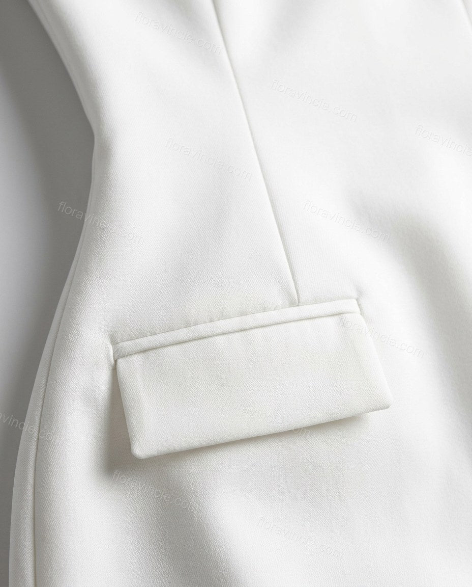 White Mini Strapless Dress, close-up of flap pockets, back zipper closure and strapless design, by Floravincie
