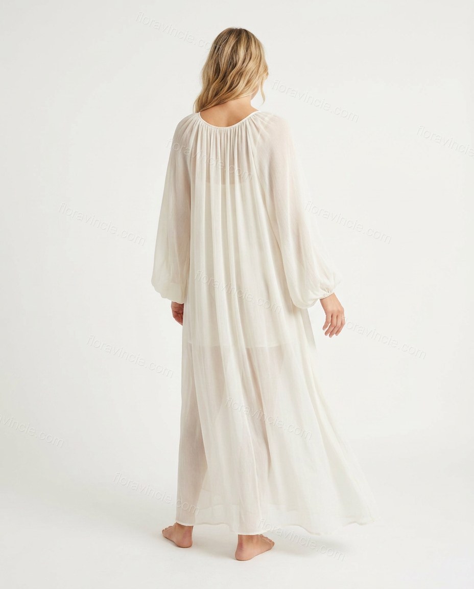 Off-white Maxi Embroidered Ruffled Dress, back studio view showing gathered round neckline at the back, flowing loosely down, by Floravincie