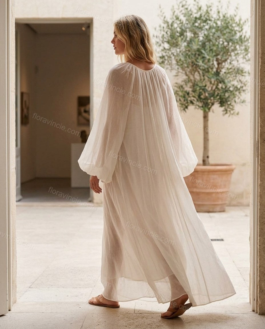 Off-white Maxi Embroidered Ruffled Dress, movement and fit lifestyle view, by Floravincie