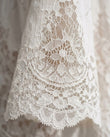 White Floral Mini Lace Dress, close-up of floral and scalloped hem, by Floravincie