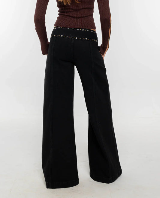 Black studded wide-leg jeans